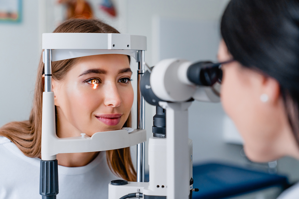 Woman having eye exam